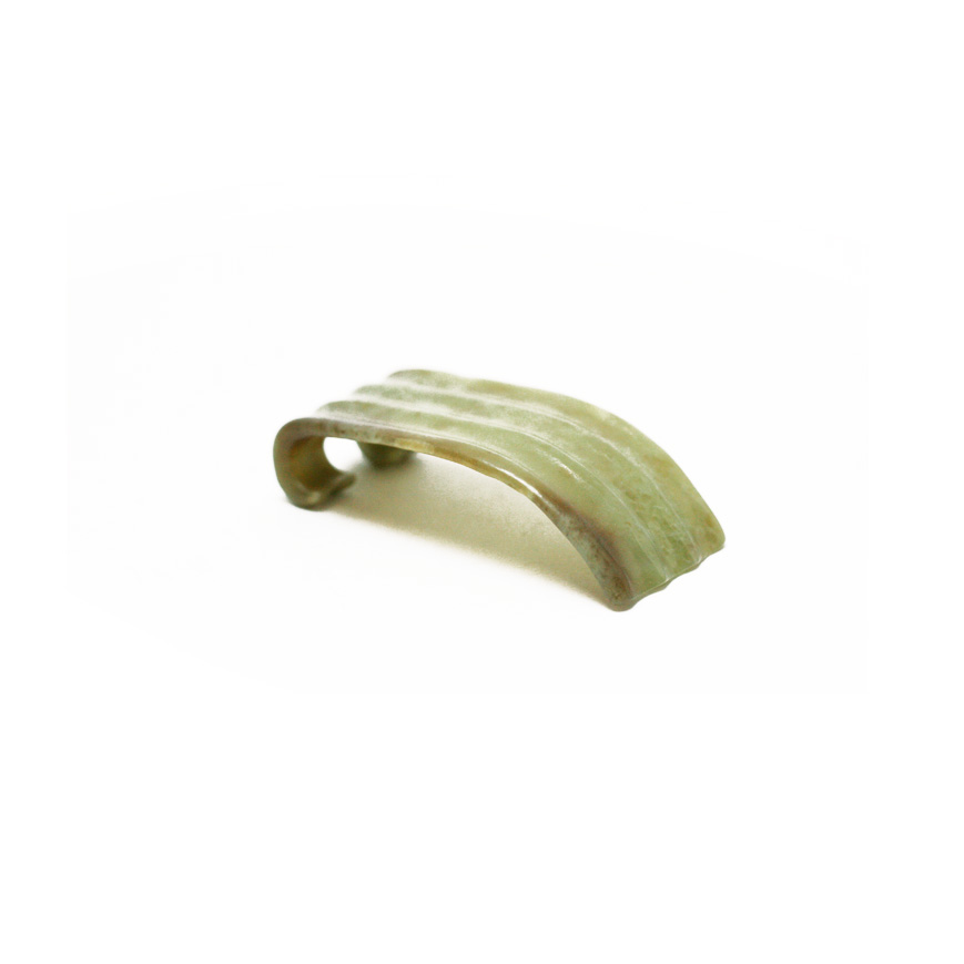 Ink rest or brush rest olive-green jade, possibly Ming