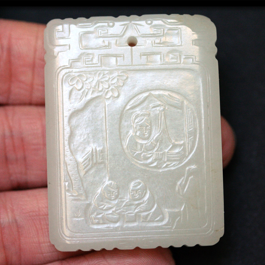 A WHITE JADE PLAQUE, LATE QING DYNASTY - EARLY 20TH CENTURY